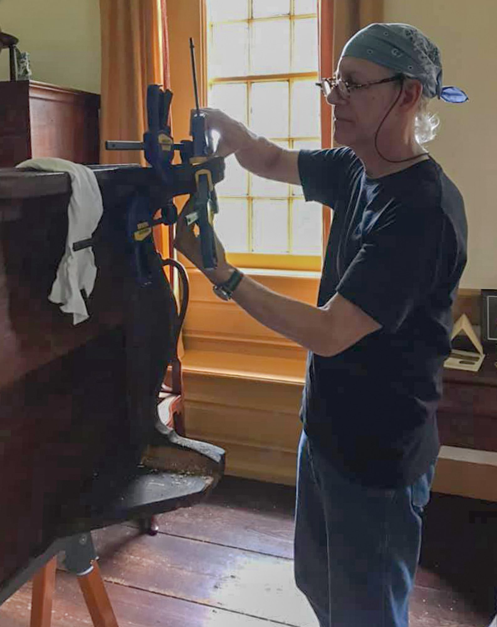 Chris Storb working on a desk at Stenton