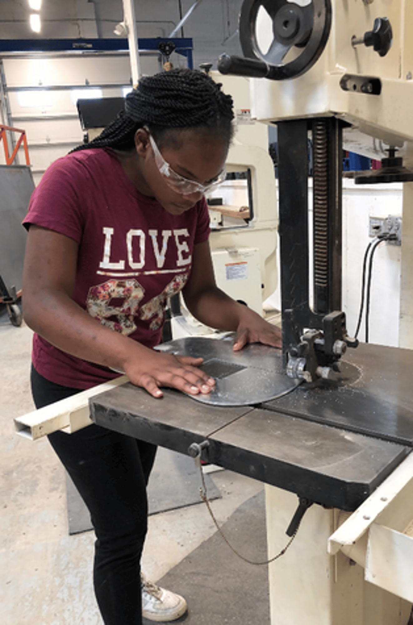 STEAM Studio student at the Bandsaw