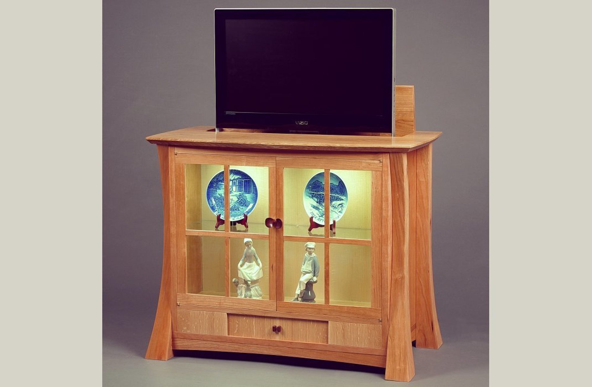 Showcase (and hidden TV cabinet) with TV extended
