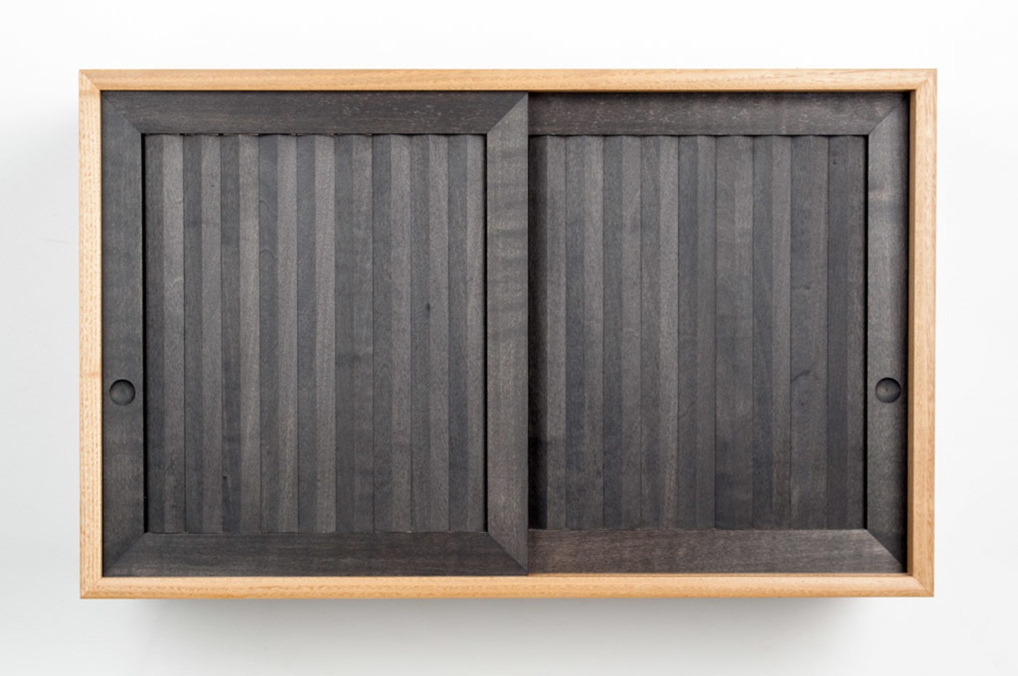 Pleated wall cabinet