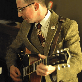 Zeke Leonard Playing Guitar