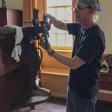 Chris Storb working on a desk at Stenton