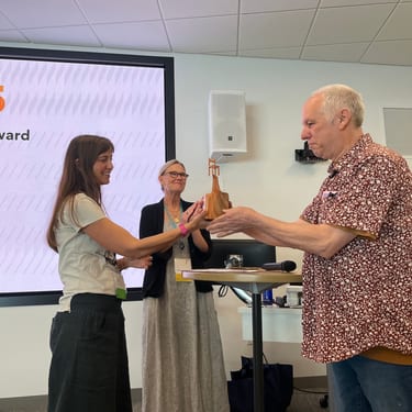 Steffi Giving Award to Fred