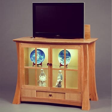 Showcase (and hidden TV cabinet) with TV extended