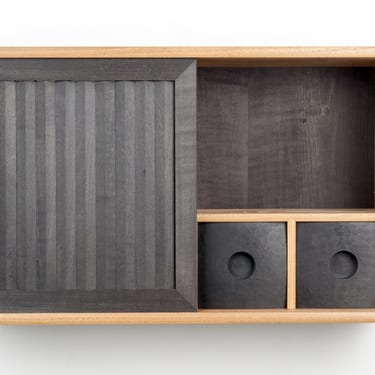 Pleated wall cabinet door open
