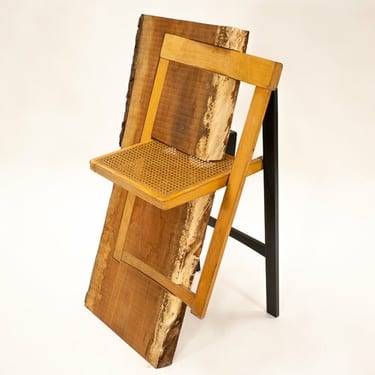 Folding Chair Embedded in Slab