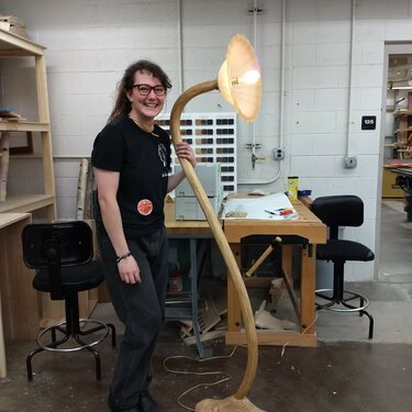 NMU Student with Wood Bent Lamp