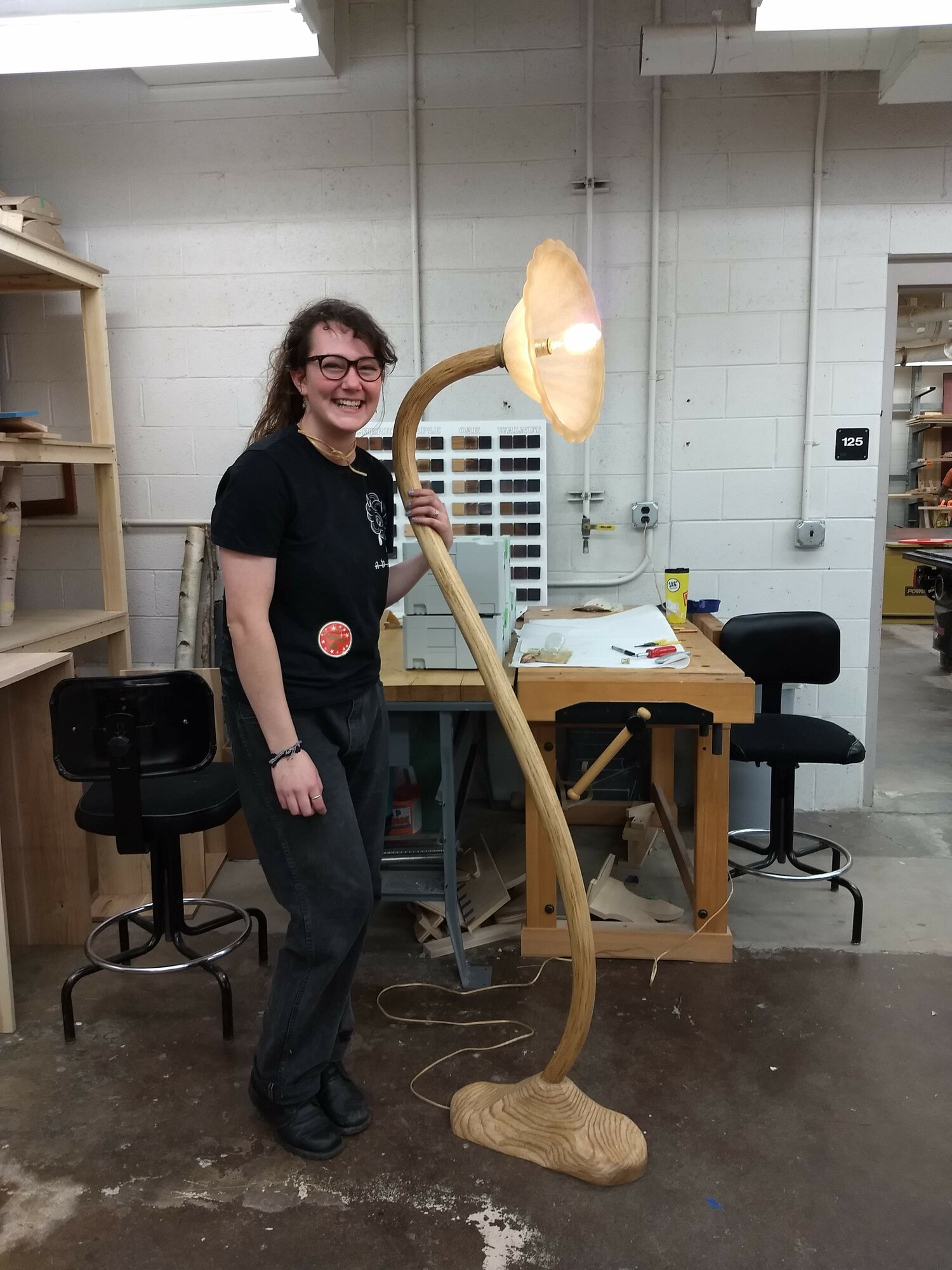 NMU Student with Wood Bent Lamp